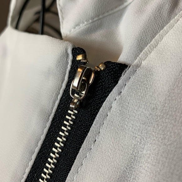 Ziranjio sleeveless asymmetrical angles blouse - Picture 6 of 8